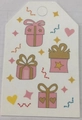 White gift tag with pink and gold gift box illustrations and round hanging hole - Gift Tag - White Background Gifts