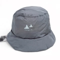 Detailed view of dark gray quilted bucket hat with printed logo and waterproof fabric - M (56-59cm) / Gray