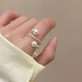 Minimalist spiral open ring featuring two white pearls on a twisted silver band - J937 Pearl Spiral Open Ring