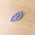 Blue carrot shaped candy color hair clip with green leaves on wooden background - Dark Blue