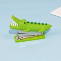 Mini green crocodile-shaped stapler with a matte finish and smooth metal mechanism - Crocodile