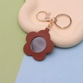 Brown flower-shaped PU leather keychain with a small mirror and gold metal ring - Flower Coffee