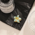 Elegant gold-tone bohemian flower hair claw clip with teal enamel petals for women - Blue
