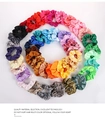 Set of multi-colored satin silk scrunchies in various shades on a white background - 40Pcs Multicolor Set