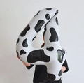 Standing number 4 aluminum foil balloon featuring classic black and white cow print patterns - Cow Pattern Style
