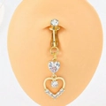 Detail of gold heart clip-on navel ring with white zircon on a silicone model - Triple Heart Dangle (K-483) / Gold (Non-Piercing)