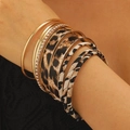10-piece gold bracelet set with wide leopard print cuff and rhinestone accents - 17 KC Gold A-630