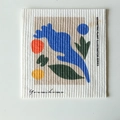 Square compressed wood pulp sponge with blue and green geometric plant illustration - Flower Buds
