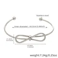 Zilveren bowknot open manchetarmband van roestvrij staal met gedetailleerde afmetingen - Strik Open Armband / Staalkleur
