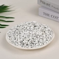 Irregular natural white turquoise crystal chips displayed in a white round plate - White Turquoise (7-9mm) 100g