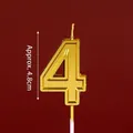 Golden number 4 birthday cake candle with metallic finish, 4.8cm height on red background - New Number 4 Golden Candle