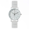 Minimalist white quartz watch with artistic numerals and stretch metal band - White