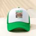 Green and white mesh trucker hat with Tasmania scenic print and breathable side panels - Green
