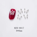 Close-up of 8x8mm silver butterfly nail charms with rhinestones on red manicure - Silver Butterfly With Rhinestone (8817)