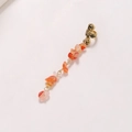 Golden ear cuff earring featuring orange natural stone pendant with hammered texture - Orange White Short