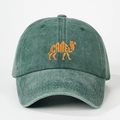 Close-up of orange camel embroidery on washed green cotton vintage baseball cap - Adjustable / Dark Green