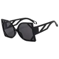 Avant-garde black cat-eye sunglasses featuring unique geometric cutout temple design - Black Frame Black Grey Lens