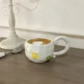French retro ceramic coffee mug with irregular handle and hand-painted floral pattern - Relief Hand-painted Petals Mug / Single Cup