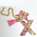 Letter X keychain charm with colorful heart sequins, pink butterfly and gold tassel detail - Letter X