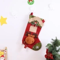 Close-up of red Christmas stocking with 3D reindeer doll and snowflake patterns - Reindeer Style