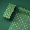 Green kraft gift wrapping paper with golden Christmas tree patterns and hemp rope - Large and Small Trees