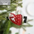 Hand-painted Santa Claus metal Christmas tree ornament with rustic hemp rope hanging loop - Flying Santa