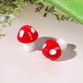 Miniature resin mushroom stud earrings in red and white with a glossy ceramic finish - Red