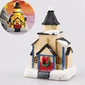 LED lighted Christmas resin church figurine with snow details and festive wreath - Medium Style H (Church)