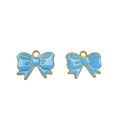Detailed view of sky blue enamel bow pendant with gold metallic edges for jewelry making - Sky Blue