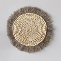 Round woven straw wall decor featuring beige spiral center and grey fringe tassel trim - Grey Tassel Decorative Mat (26cm)