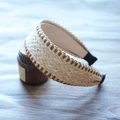 Detail of beige raffia straw headband featuring brown woven edges and natural texture - Beige with Brown Stitching