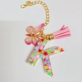 Letter K resin keychain with colorful sequins, pink butterfly and faux suede tassel - Letter K