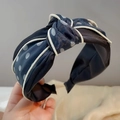 Navy blue polka dot headband with cross knot and delicate cream piping detail - S6 Black Polka Dot Edged Knot Style