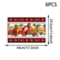 Detail view of 6pcs Christmas placemats with red plaid and ornaments, size 44x29.5cm - 4 Pieces