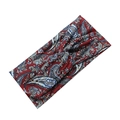 Close-up of red paisley patterned headband featuring a stylish central twist detail - Burgundy Paisley Pattern