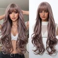 Detail view of long wavy wig with bangs in gradient smoky pink and ash purple - Smoky Pink