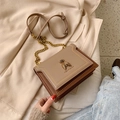 Chic bee-shaped metal buckle crossbody bag in khaki and dark brown patchwork leather - Khaki