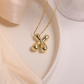 Minimalist 18K gold plated puffy letter X pendant necklace with a polished finish - Letter X (Single Pendant)