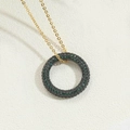 14K gold plated necklace featuring a black circular pendant with green zircon pavé stones - Dark Green