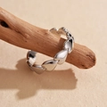 Minimalist S925 sterling silver heart-shaped ring in bright silver finish displayed on wood - Size 14 (Open Adjustable) / White Gold