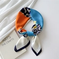 Artistic silk square scarf featuring bold orange, sky blue, and floral patchwork pattern - Semicircle Inlaid Leaf Navy Border