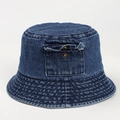 Detail of blue denim bucket hat showing decorative front pocket and metal button - M (56-58cm) / Medium Blue & White