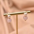 Elegant gold drop earrings with white pearls and translucent pink crystals on a T-stand - Pink Round Ball Pearl Drop Earrings