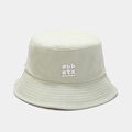 Detailed close-up of 'bb atx' embroidery on light green cotton canvas bucket hat - M (56-58cm) / Fruit Green