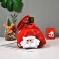 Red velvet Christmas drawstring bag featuring a 3D Santa Claus doll and snowflake patterns - Green Rim Santa