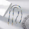 Detail of colorful crystal beaded eyewear chain with gold heart accents and lobster clasps - Royal Blue