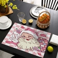 Pink plaid Christmas placemat with Santa Claus and LOVE text on a wooden dining table - CD57-37