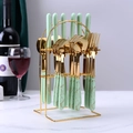 24-piece cutlery set with green marble ceramic handles and gold finish on metal rack - 24 Pieces Set + Storage Rack / Pale Green