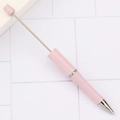 Pastel pink DIY beaded ballpoint pen with silver metal accents on a grid background - Candy Light Pink