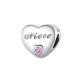 Macro detail of S925 sterling silver heart bead with Niece engraving and pink gem - Niece